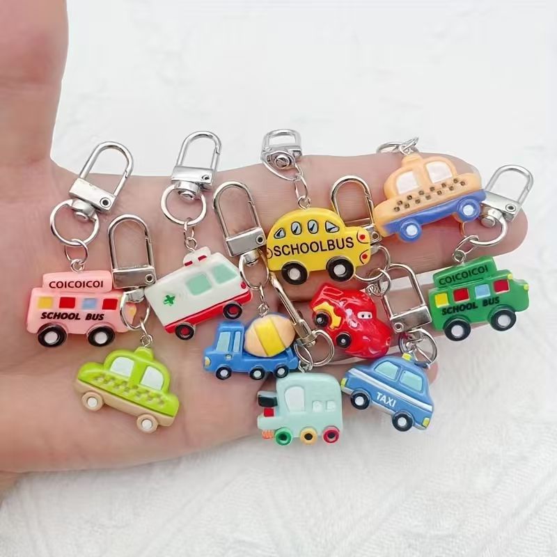Phone Accessories - พวงกุญแจรถการ์ตูนเรซิน 10 ชิ้น เหมาะสำหรับตกแต่งกระเป๋าเดินทางและโทรศัพท์มือถือ เป็นตัวเลือกที่ดีที่สุดสำหรับของขวัญ